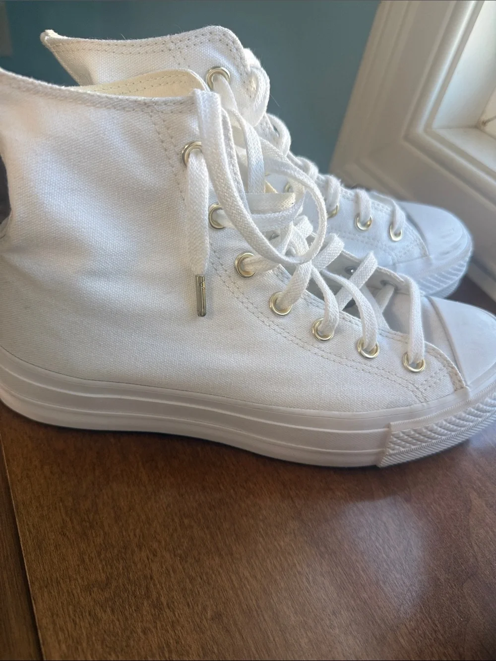 Converse White High-Top Canvas Sneakers with Gold Eyelets